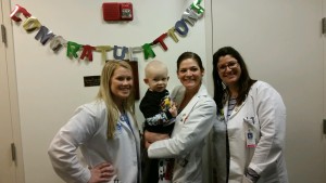 Celebrating with my radiation therapists - with me every morning.